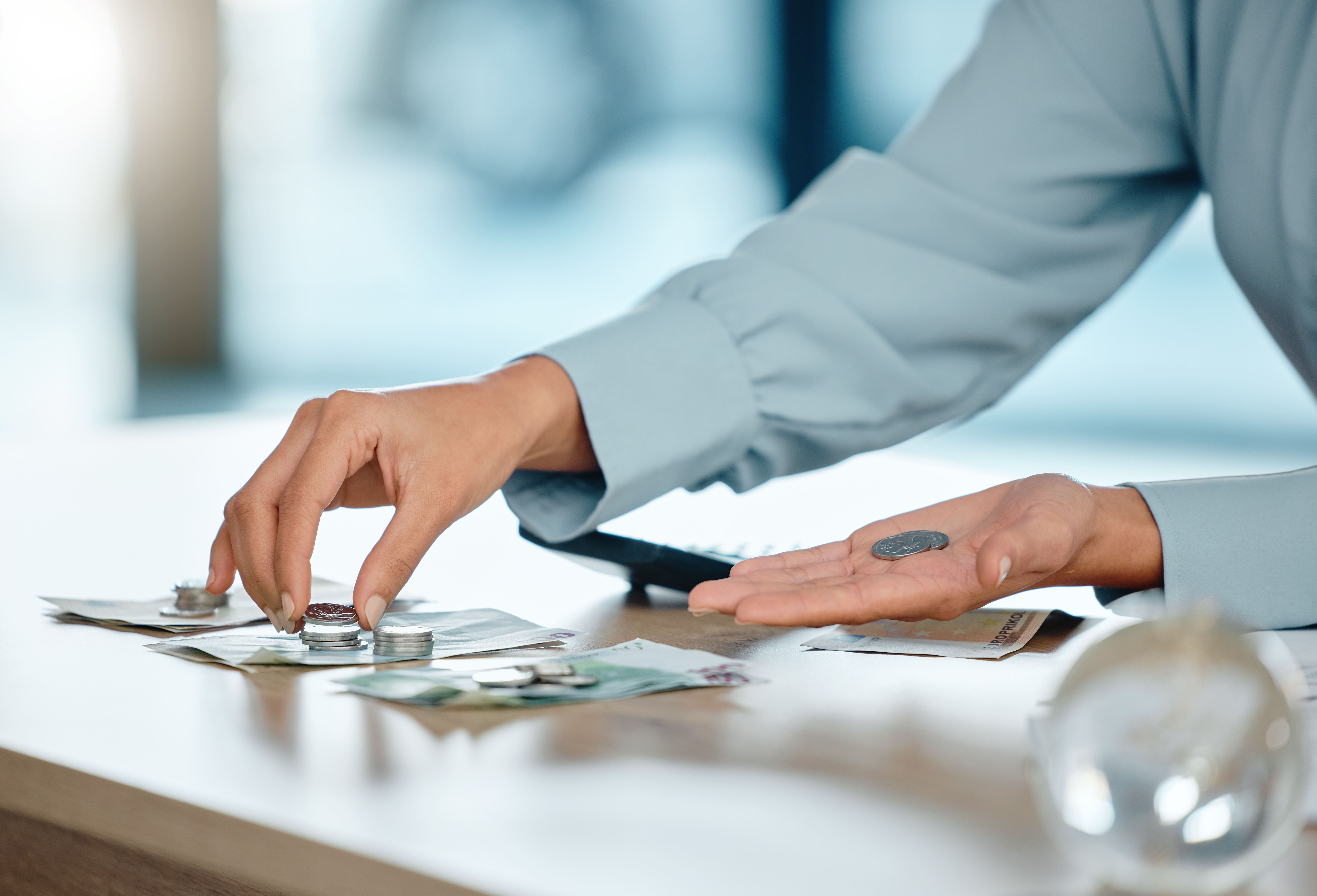 hands-counting-and-saving-money